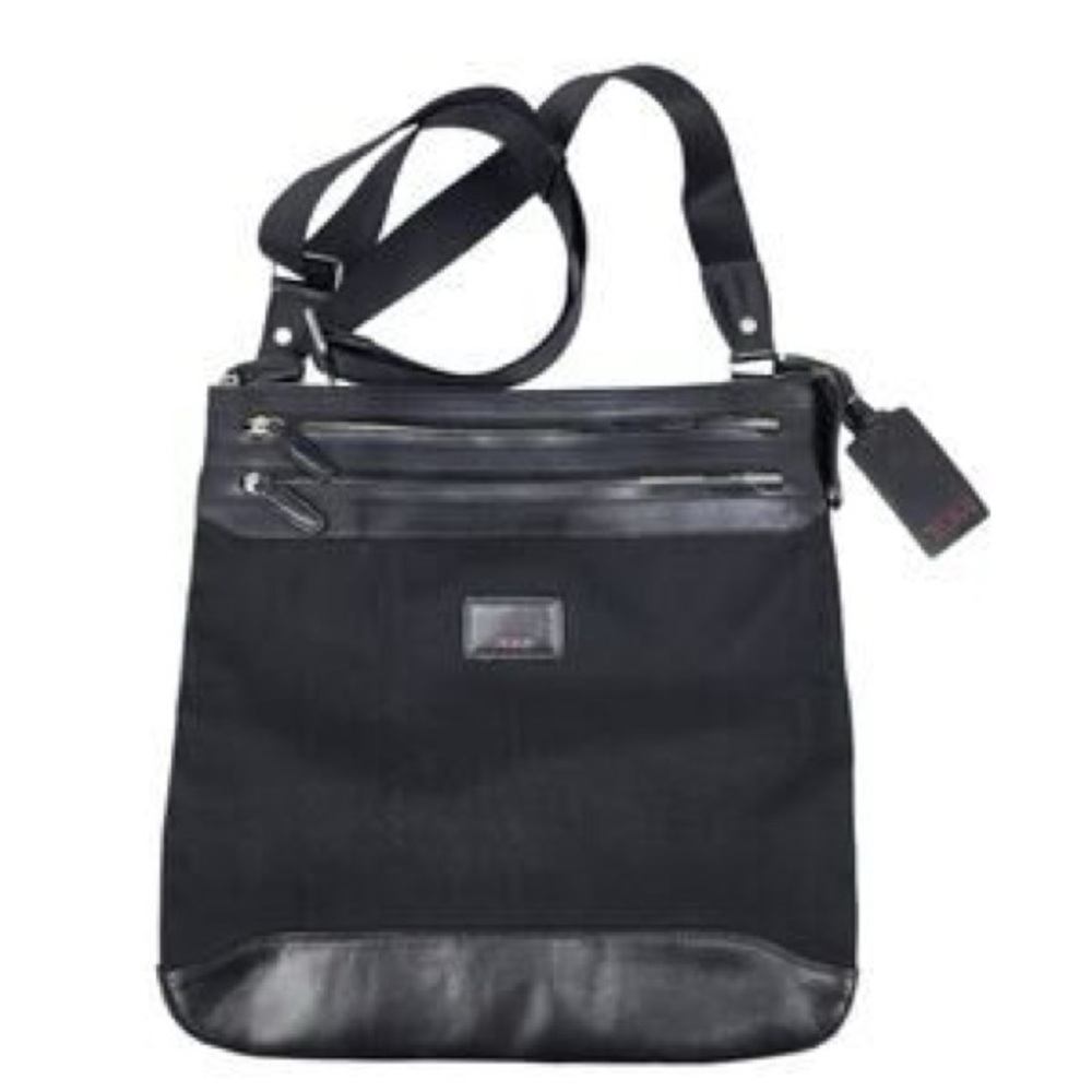 Tumi Black Messenger Bag with Silver Accents. Excellent condition